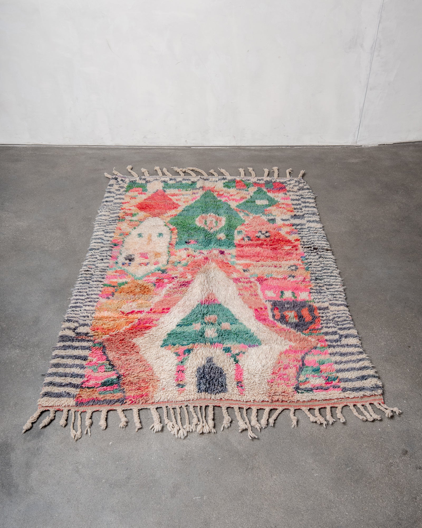 Modern designer handcrafted Berber rug from Morocco. Boujed with beautiful colors and patterns.
